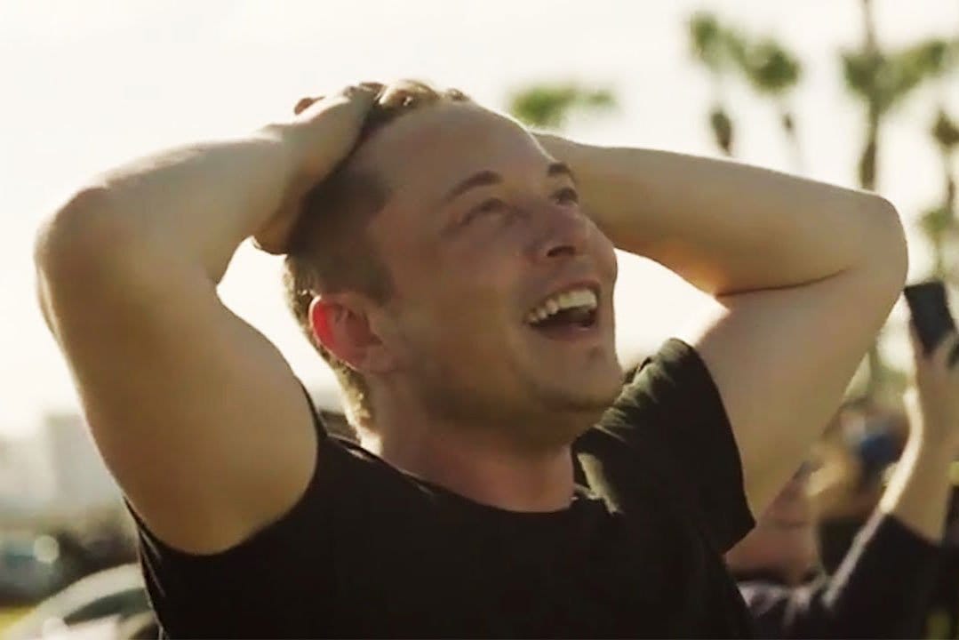 Elon-looking-at-Heavy_Web